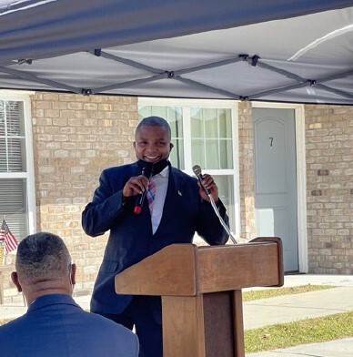 A man speaking at a podium.