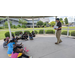 Children listening to a man talk. 