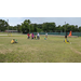 Children learning how to play soccer.