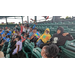 Children in the stands at a baseball game.