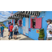 Students in line at an ice cream shop, waiting to order.