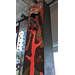 A child scaling a rock climbing wall.