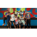 A group of children at the roller rink. 