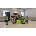 Children posing with a sign after their dance recital. 