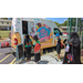 Children waiting in line at the Life Is Sweet Mobile Ice Cream Truck.