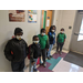 Students lined up to come into the classroom in masks. 