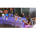 Four children sitting at a table. 